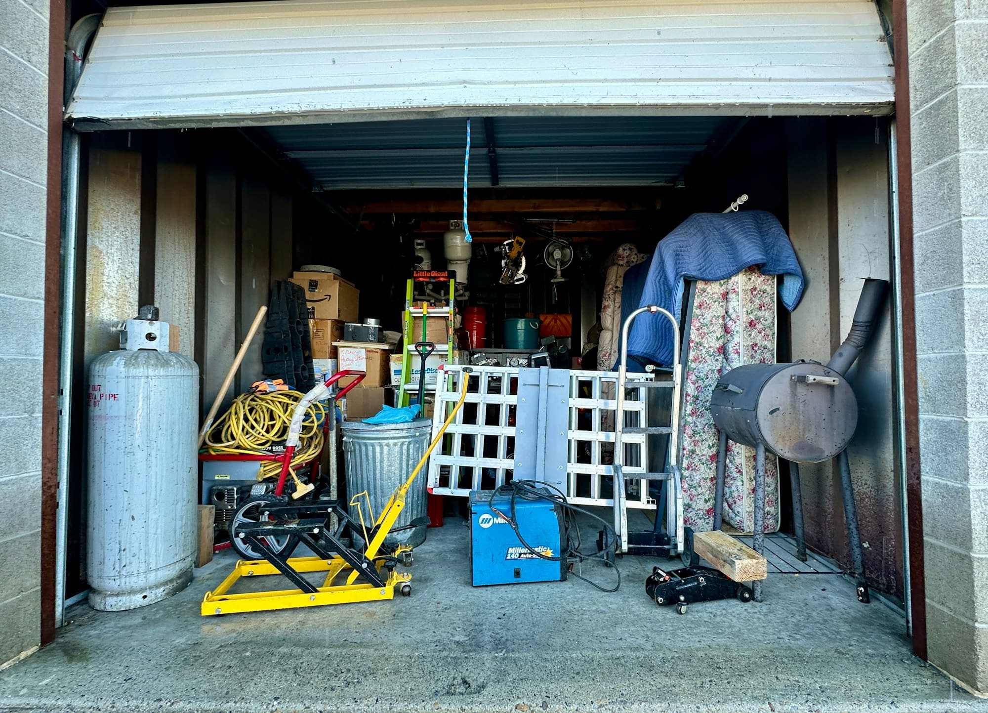 Garage filled with clutter and tools